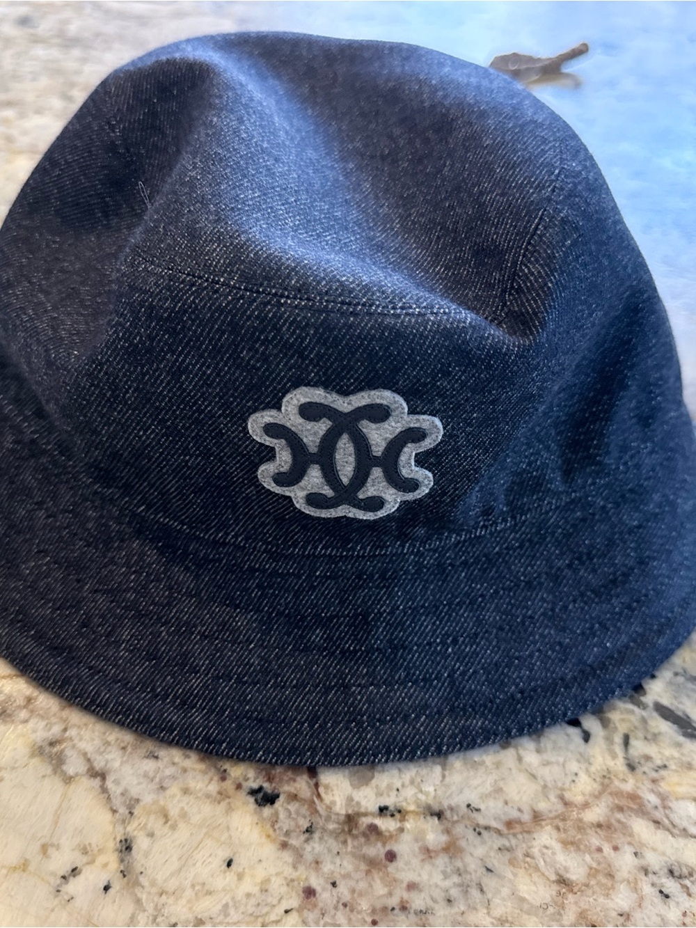 Hermes Dark Denim Bucket Hat with Silver Logo